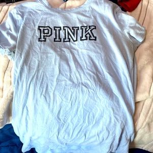 A light blue pink brand shirt